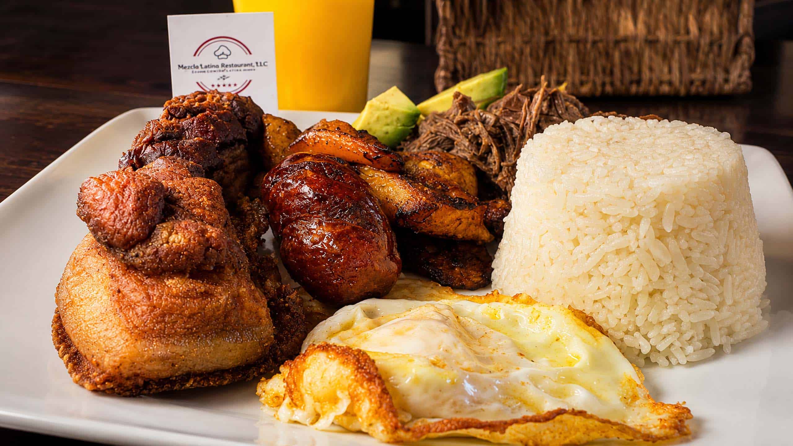 Pabellón Criollo plate with shredded beef, rice, fried plantains, avocado and egg